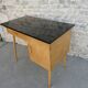 Baumann desk in light wood and black Formica, around 1960.