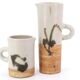 Two ceramic pitchers from the Dove pottery