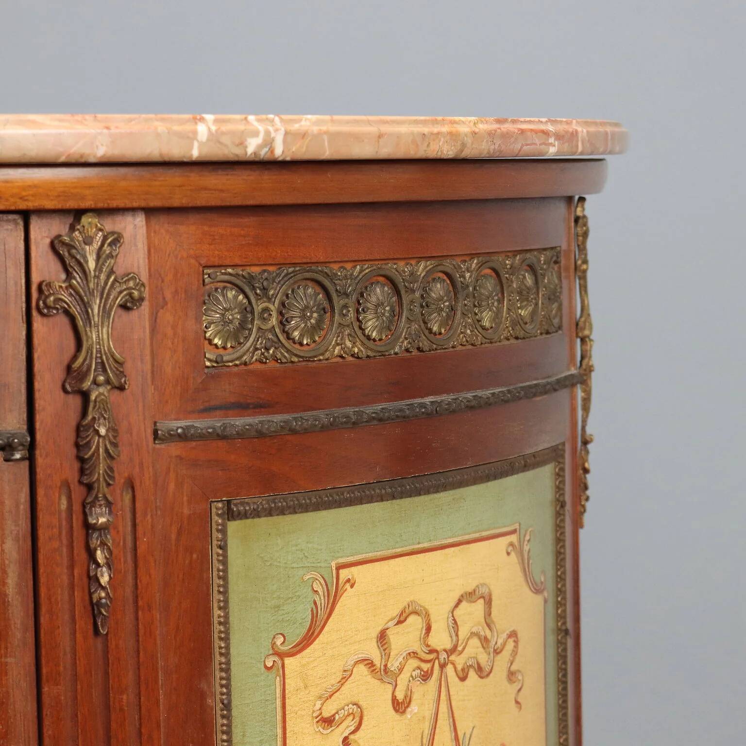 Antique demi-lune buffets in neoclassical style in mahogany from the 20th century.