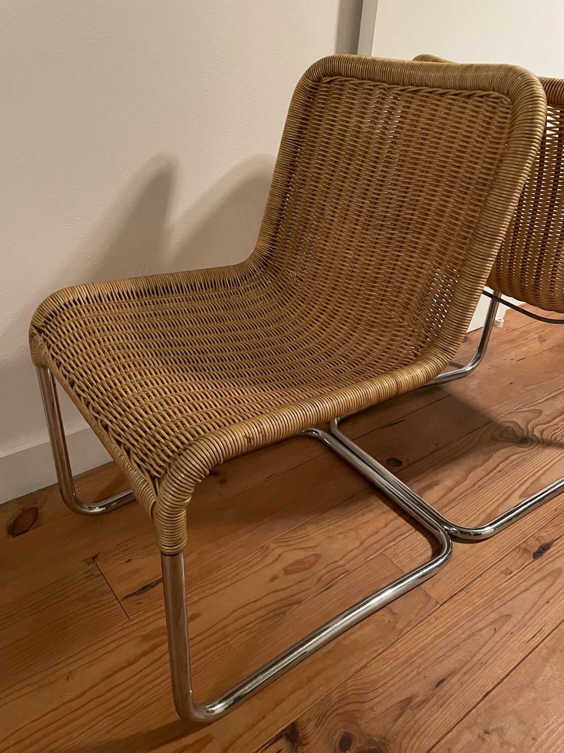 Pair of vintage rattan cantilever chairs