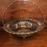 Open silver metal fruit basket