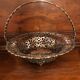 Open silver metal fruit basket