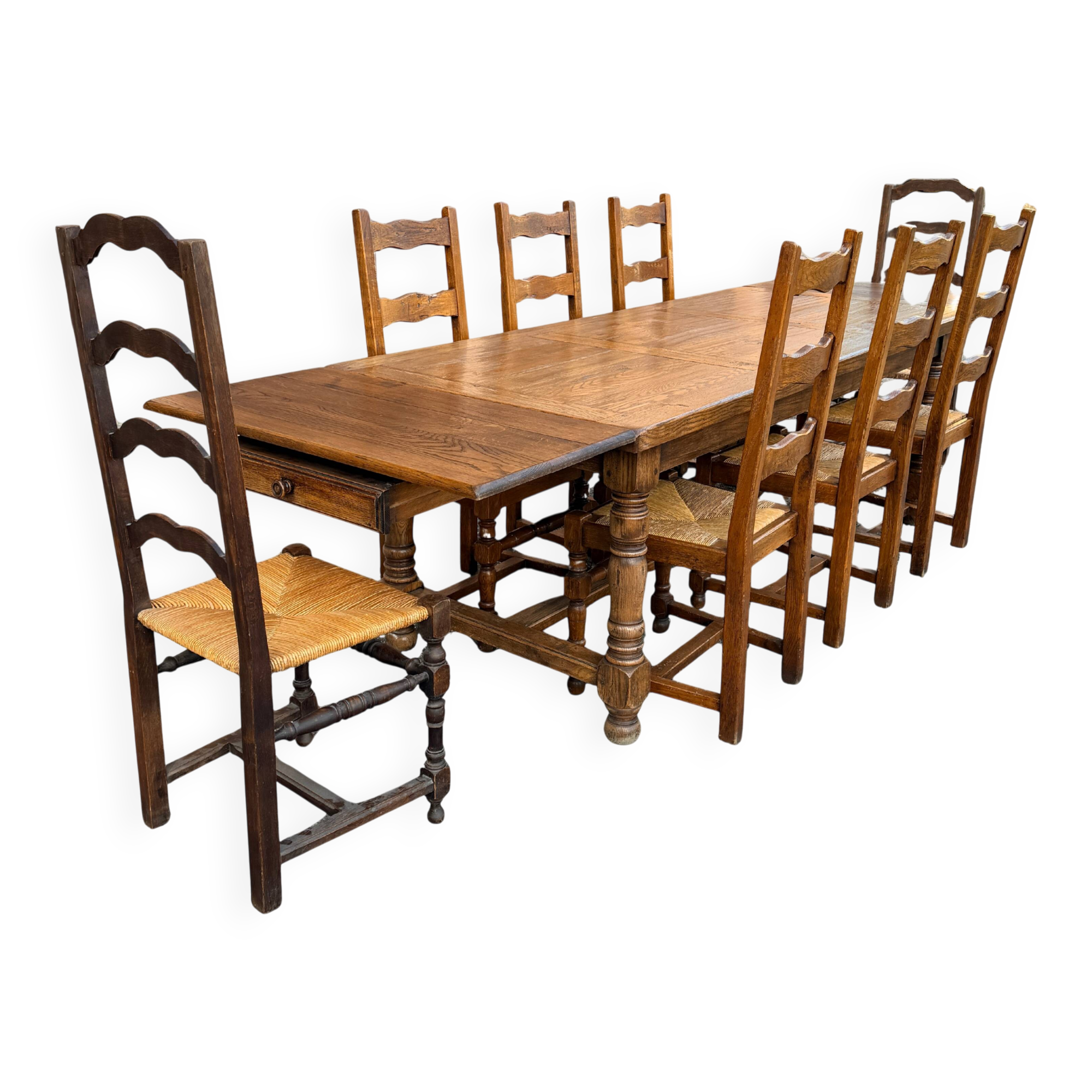 Large farmhouse table made of solid wood.