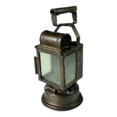 Années 1930 - ancienne lampe au carbure, lampe de signalisation ferroviaire, en cuivre, métal et verre, par A. Butin/Paris