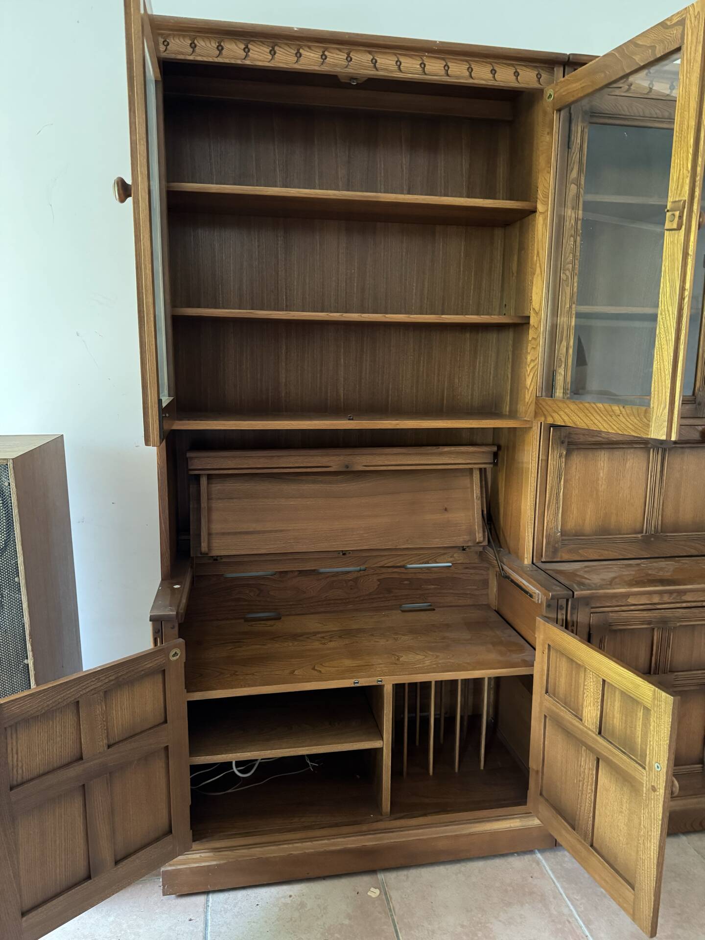 Ercol library cabinets storage England in elm