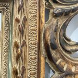 Napoleon III style mirror in carved wood, 20th century.