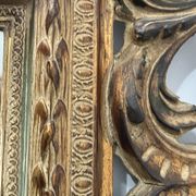 Napoleon III style mirror in carved wood, 20th century.