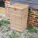Old rectangular laundry basket in light wicker