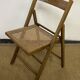 Chaise pliante en bois et cannage vintage