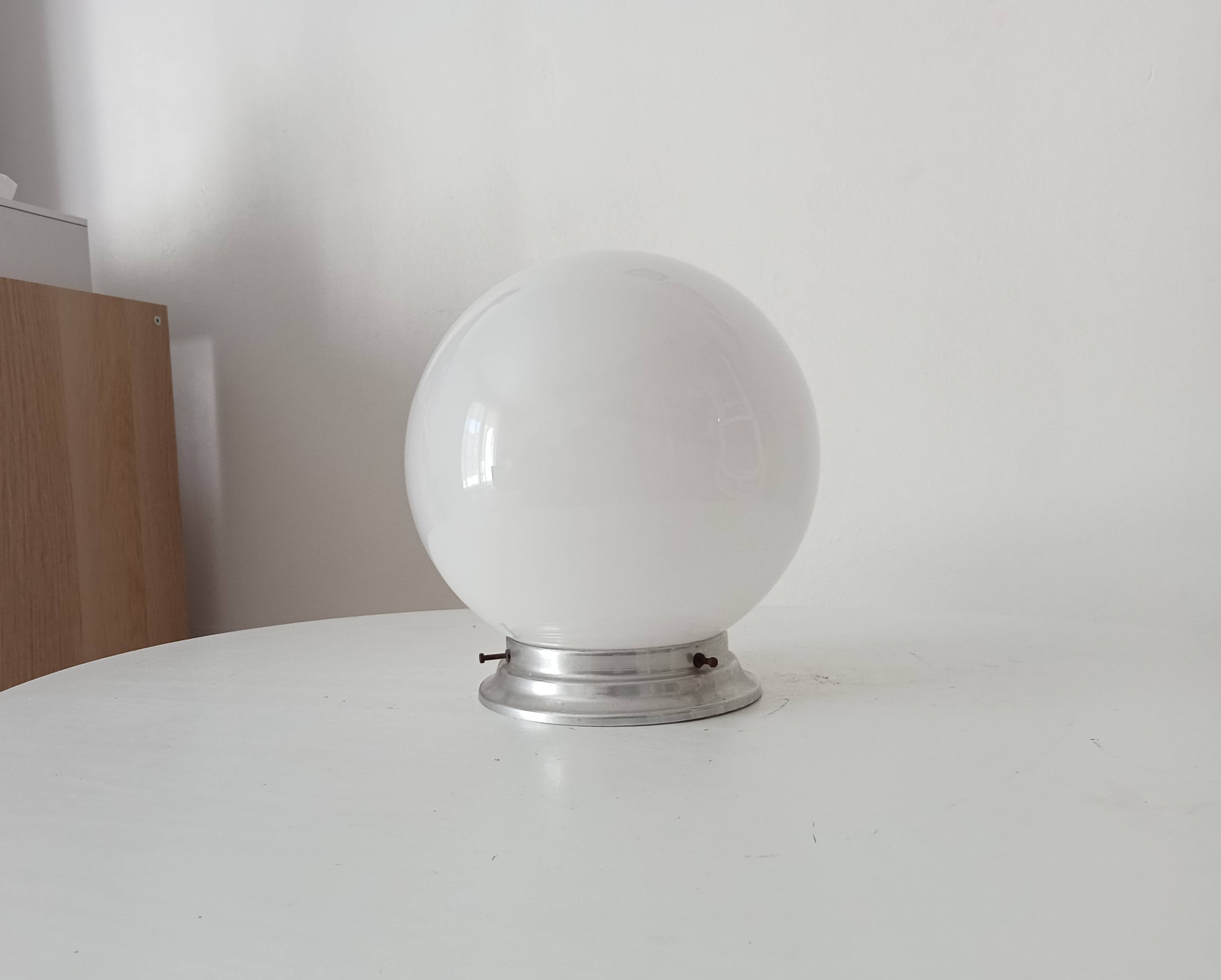 Vintage opaline and aluminium ceiling light from the 1950s.