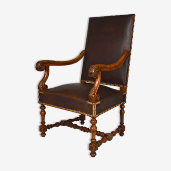 Louis XIII office armchair in leather and walnut carved around 1860