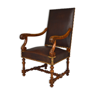 Louis XIII office armchair in leather and walnut carved around 1860