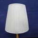 Lampadaire porte revues en rotin