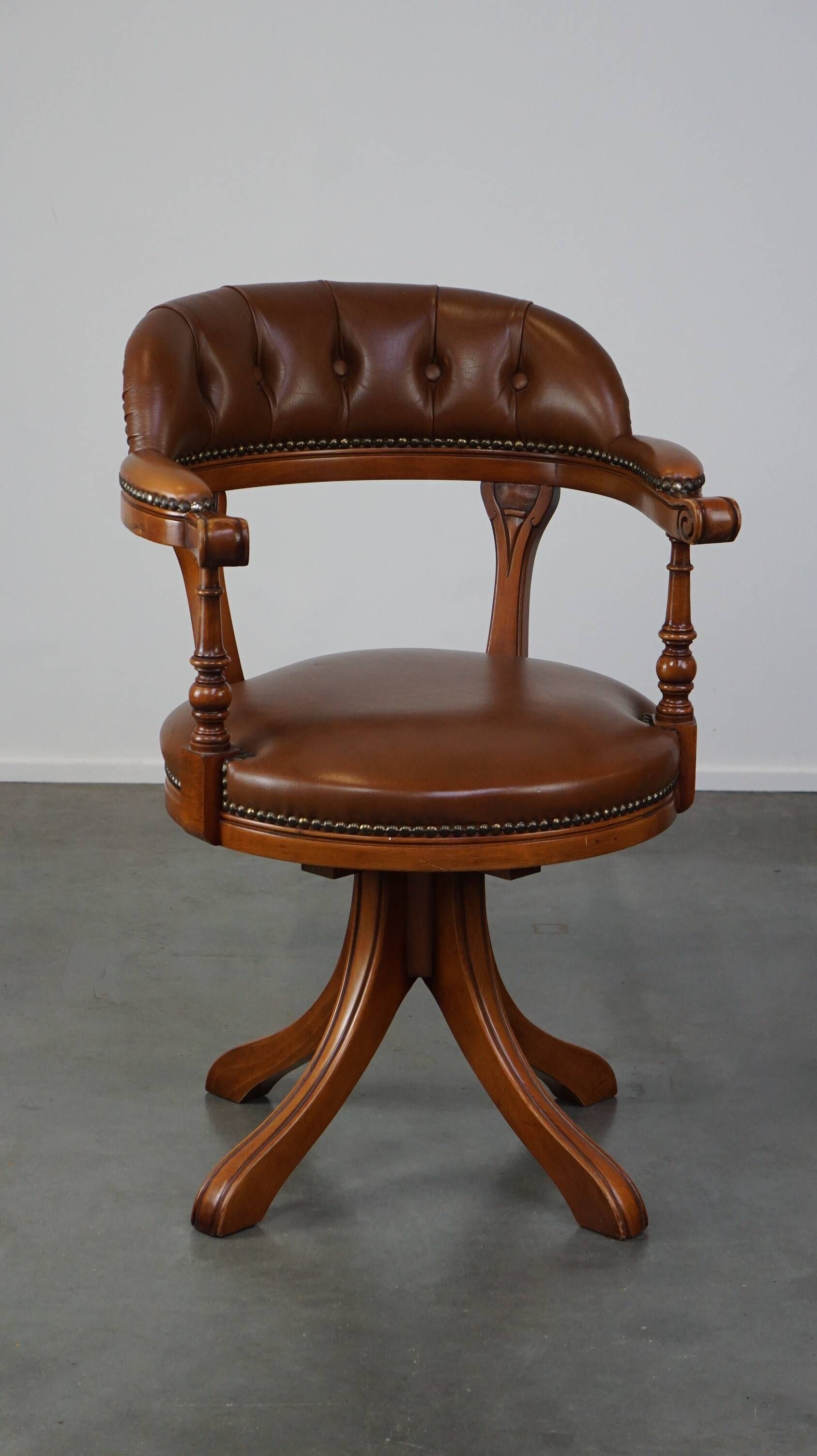 Swivel English style Chesterfield armchair/office chair in brown cowhide