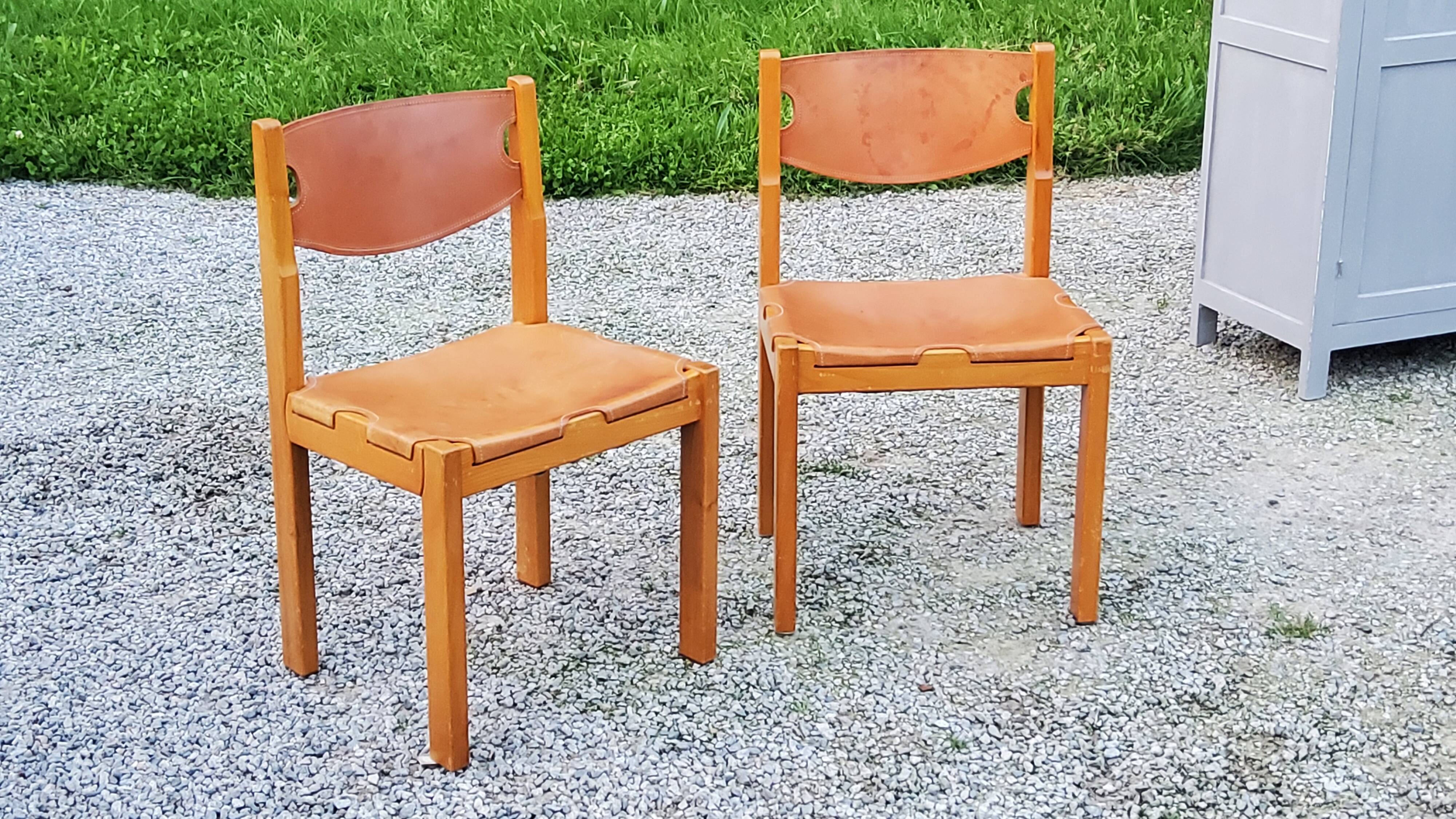 Pair of brutalist chairs in elm and stretched leather with saddle stitching Self publisher