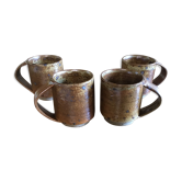 4 tasses a café en grès signées