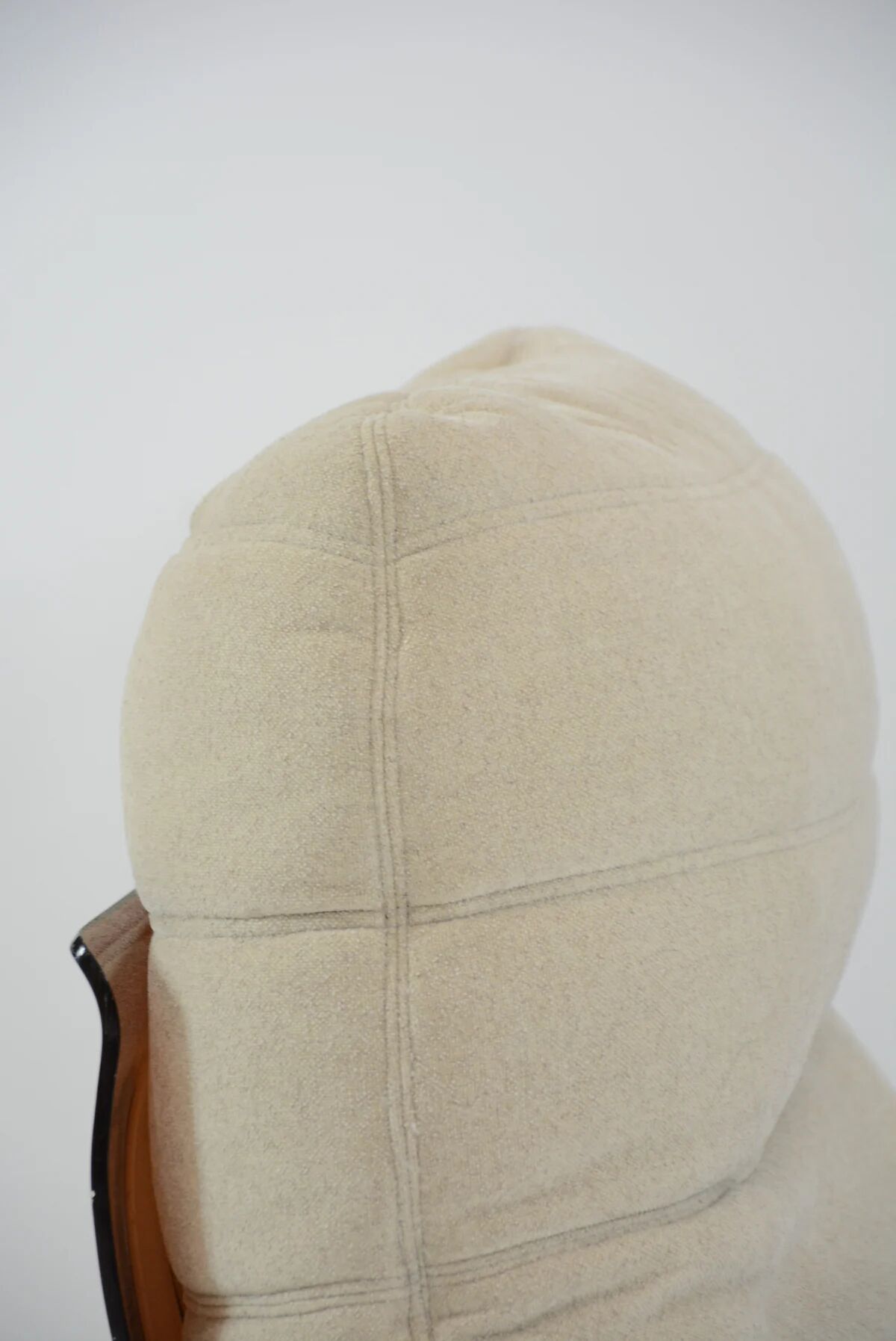 Marsala armchair and its light beige Ligne Roset footrest.