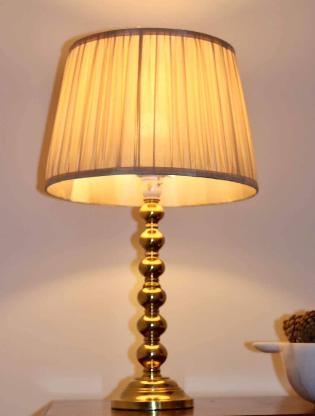 Pair of Swedish brass lamps from the mid-century.