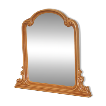 Vintage Art Deco decorative mirror with a thick frame.