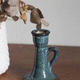 Antique candle holder in glazed ceramic
