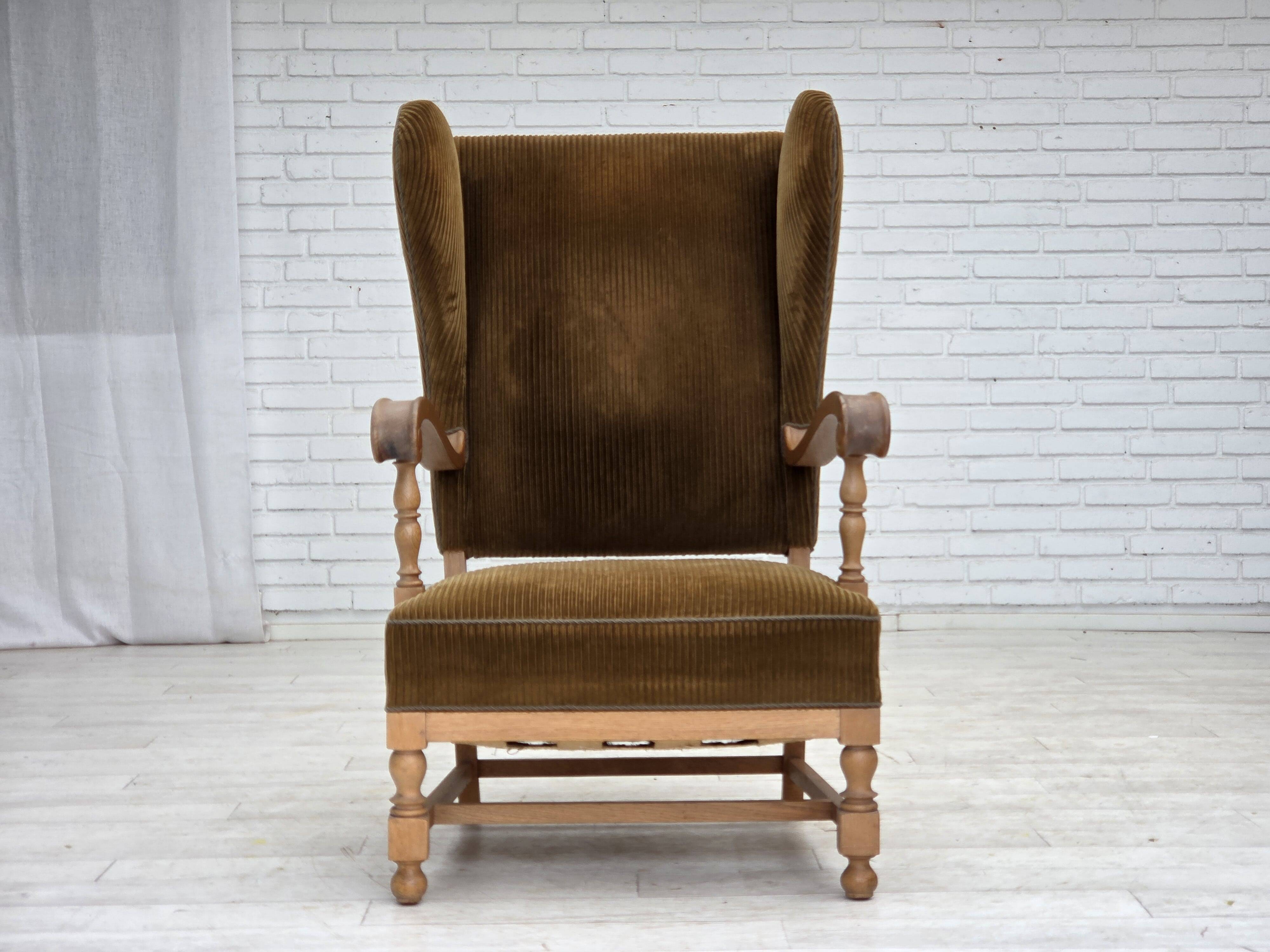 1970s, Scandinavian highback armchair, furniture corduroy, carved oak wood.