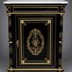 Napoleon III style commode, decorated with brass marquetry and gilded bronze mounts.