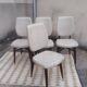 Set of 4 white and wooden Scandinavian chairs.