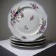 4 Bernardaud Limoges porcelain dinner plates with floral decoration, 1920s-1950s