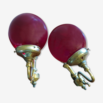 Pair of vintage brass wall light and cherry red globe