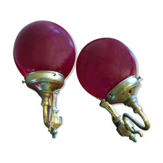 Pair of vintage brass wall light and cherry red globe