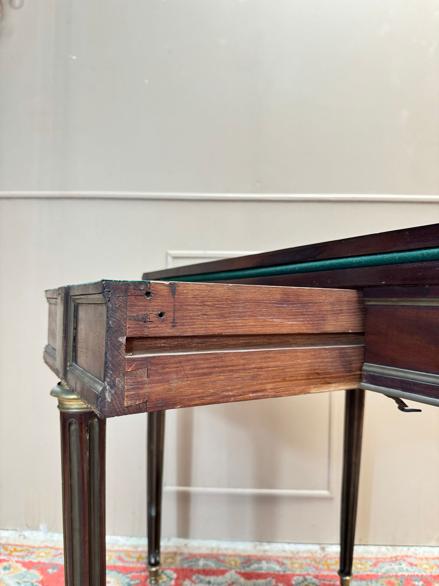 Half-moon table in mahogany from the Louis XVI period, 18th century.