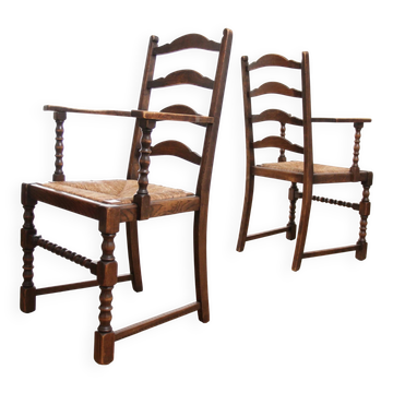 Pair of English oak armchairs with ladder back and rush seats