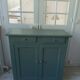Vintage Parisian sideboard with 2 doors and 2 drawers, re-enchanted in smoky green.