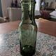 Lot de 5 bouteilles anciennes en verre vert olive