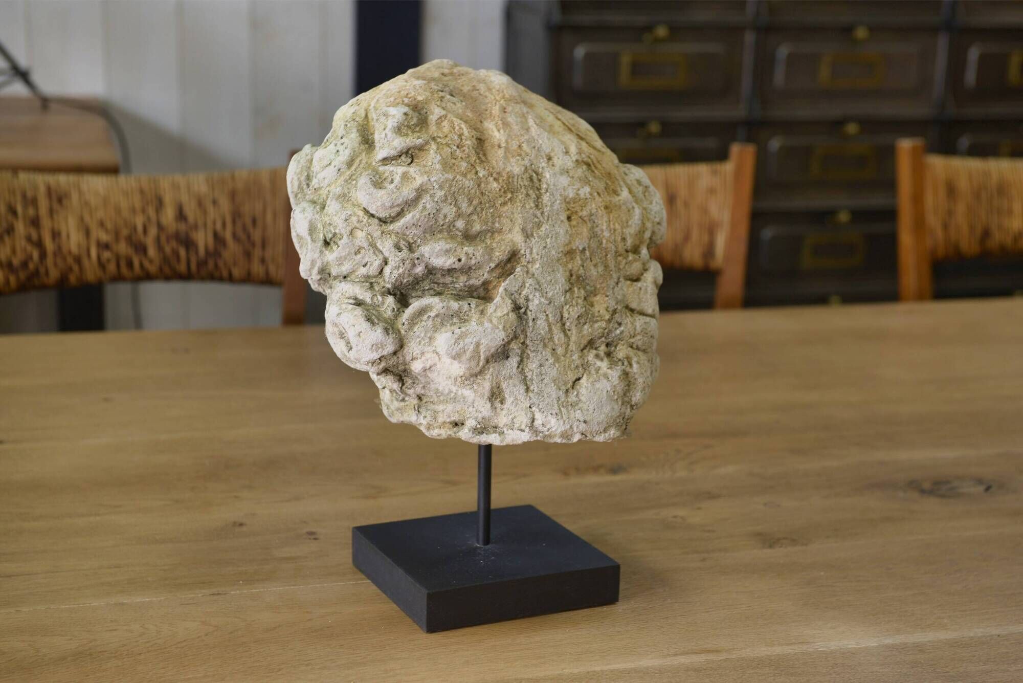 Reconstituted stone sculpture in antique style from the 20th century.