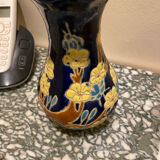 Small vase with floral patterns in the style of Longwy.