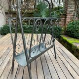 Art Deco magazine rack in wrought iron with bronze patina from around 1930-1940.