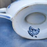 Old earthenware sauce boat