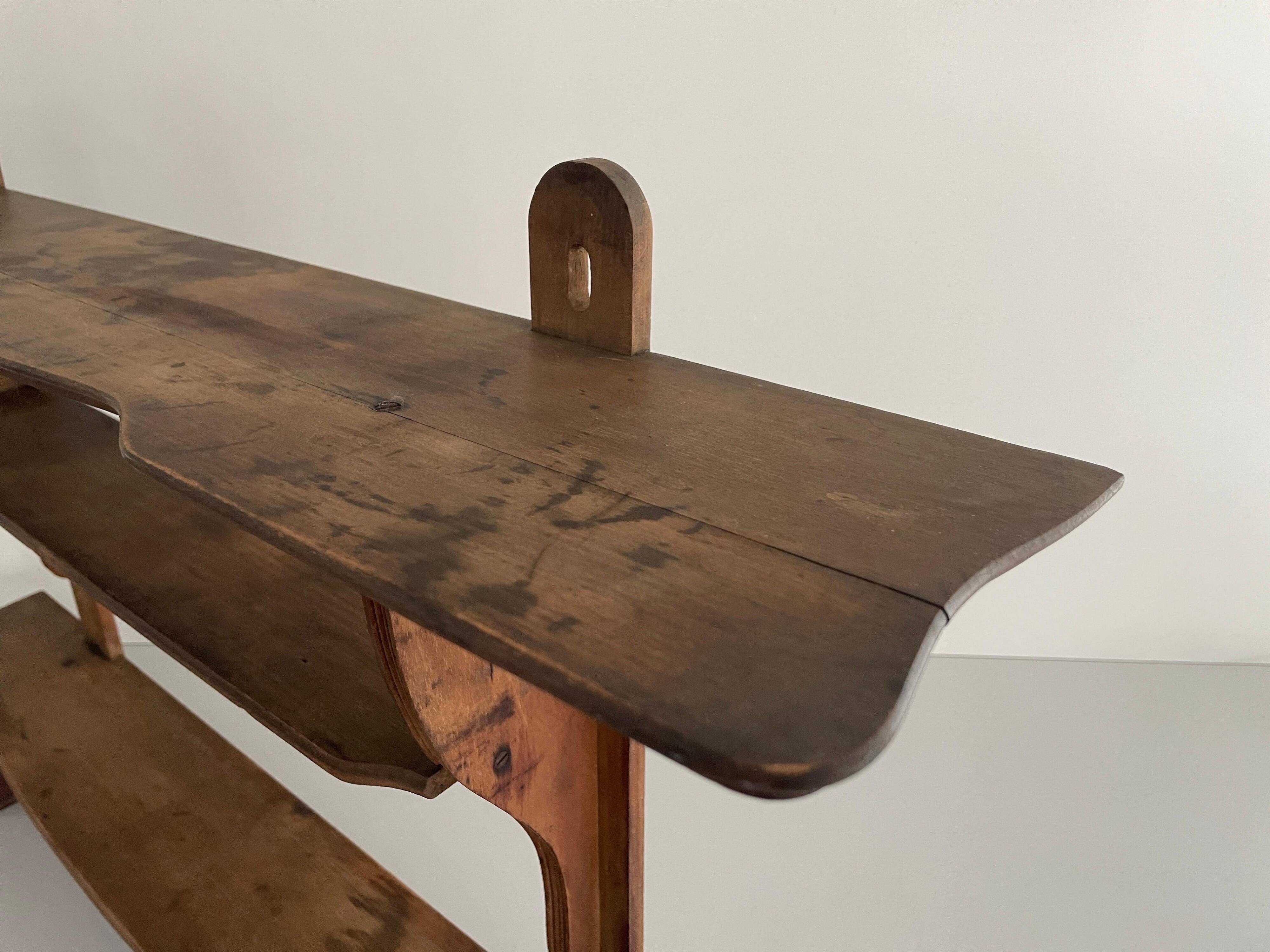 Art Deco wall shelf in wood with three levels, 1940s, Italy.