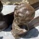 Pair of antique cast iron fire dogs "The Conquering Love"