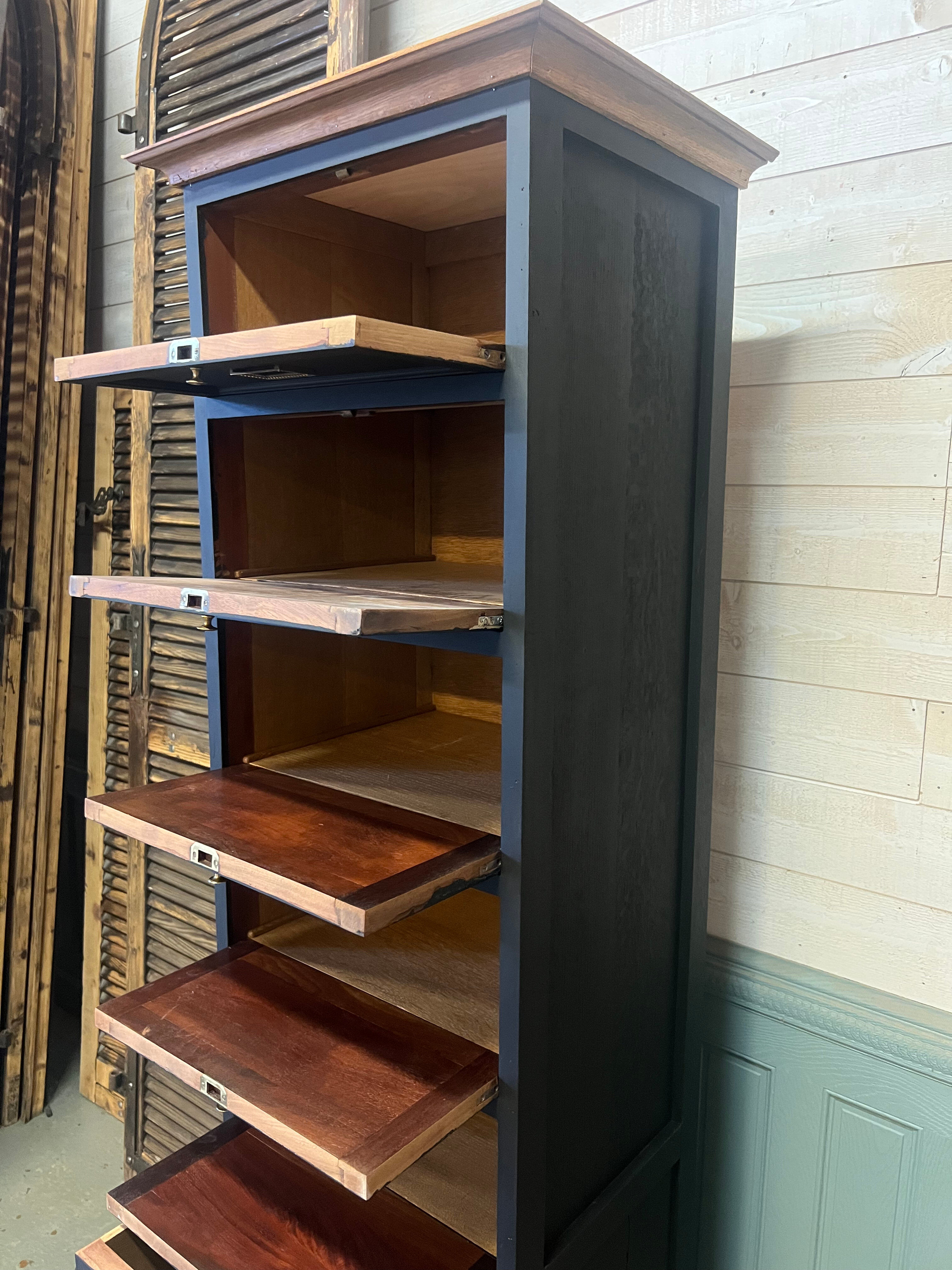 Cabinet with flaps and drawers