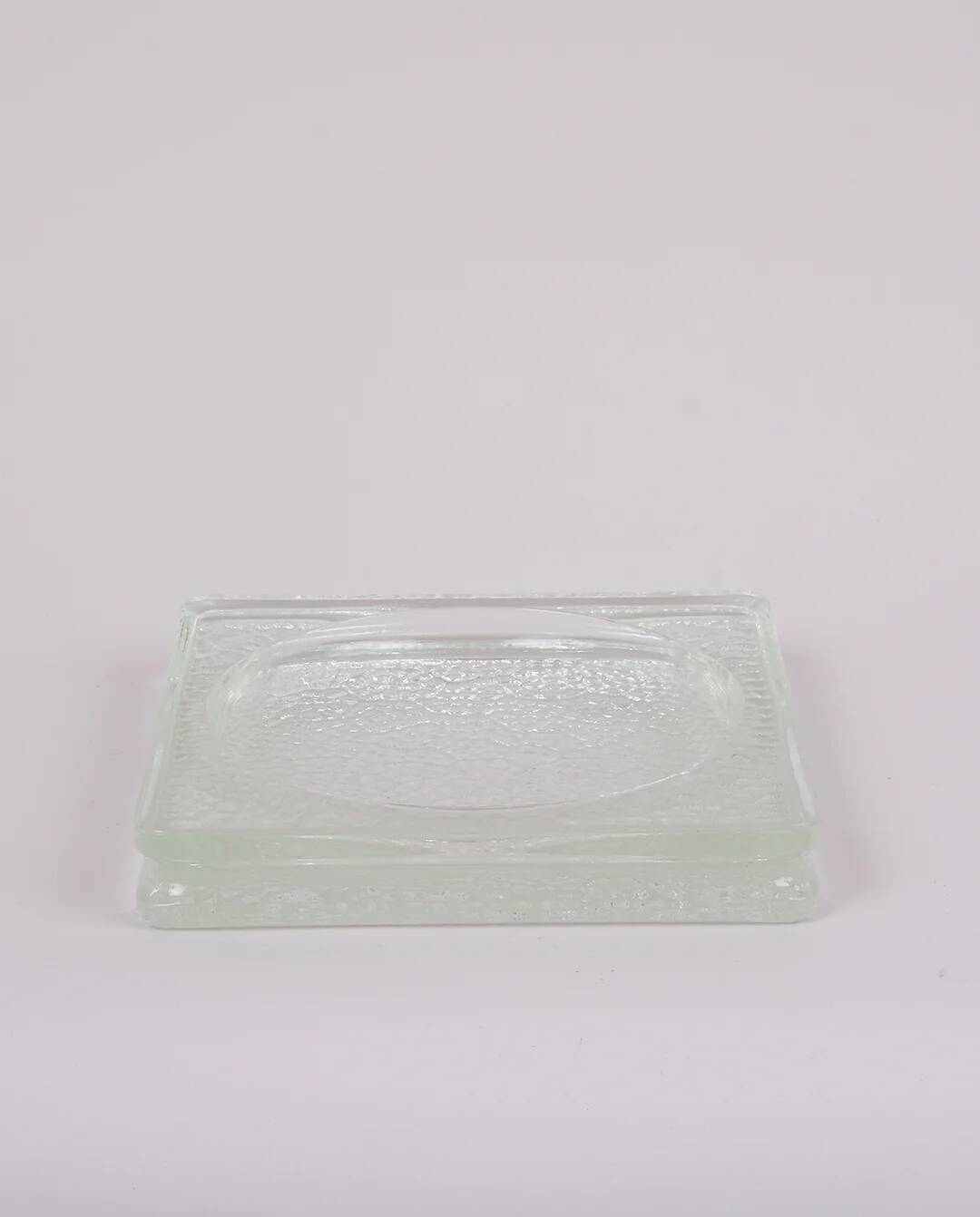 Pressed glass pocket emptier