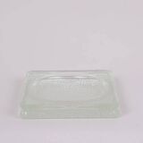 Pressed glass pocket emptier