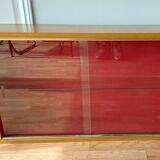 Glass wall shelf in light oak 1960