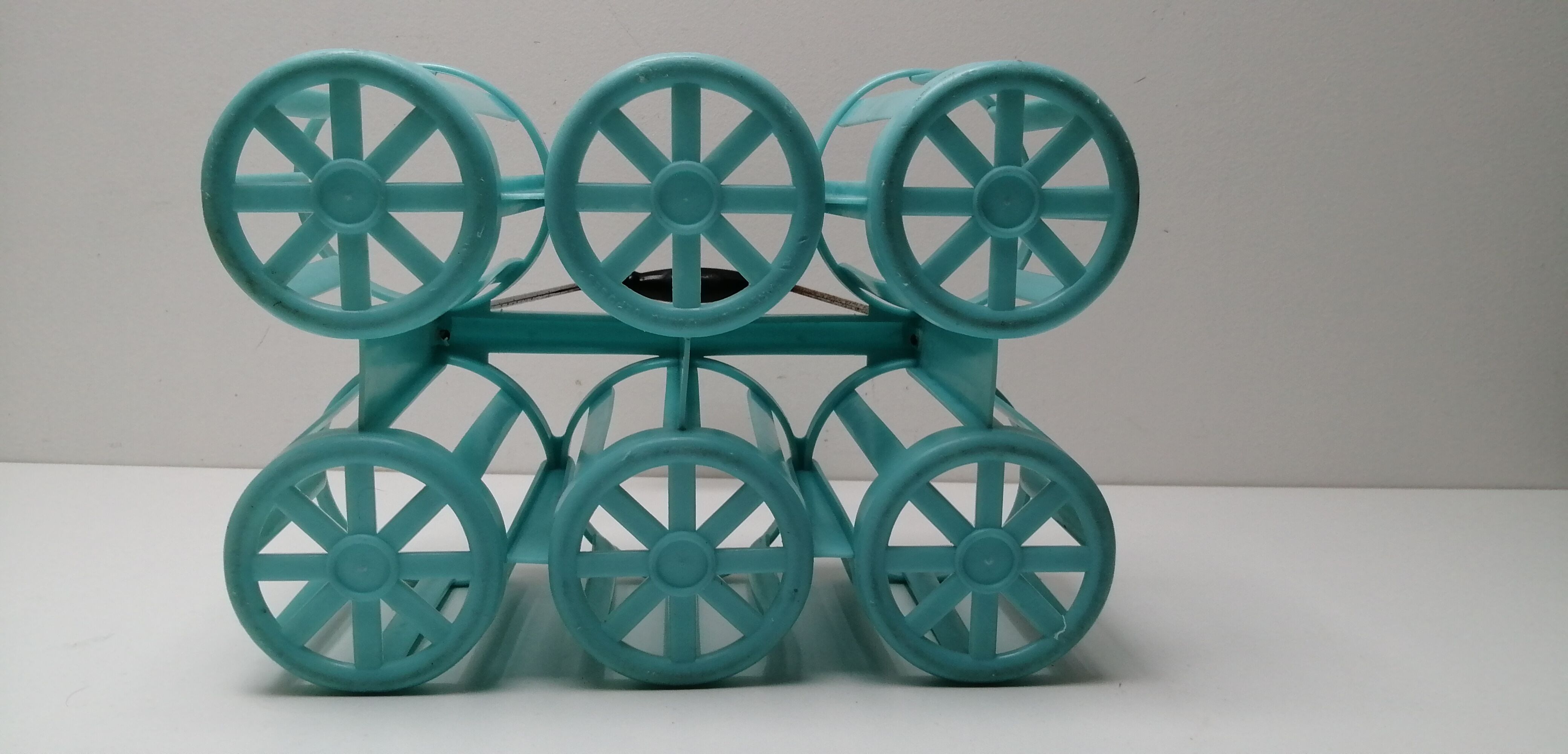 Vintage blue plastic bottle holder