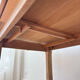 Solid oak farmhouse table with extensions.