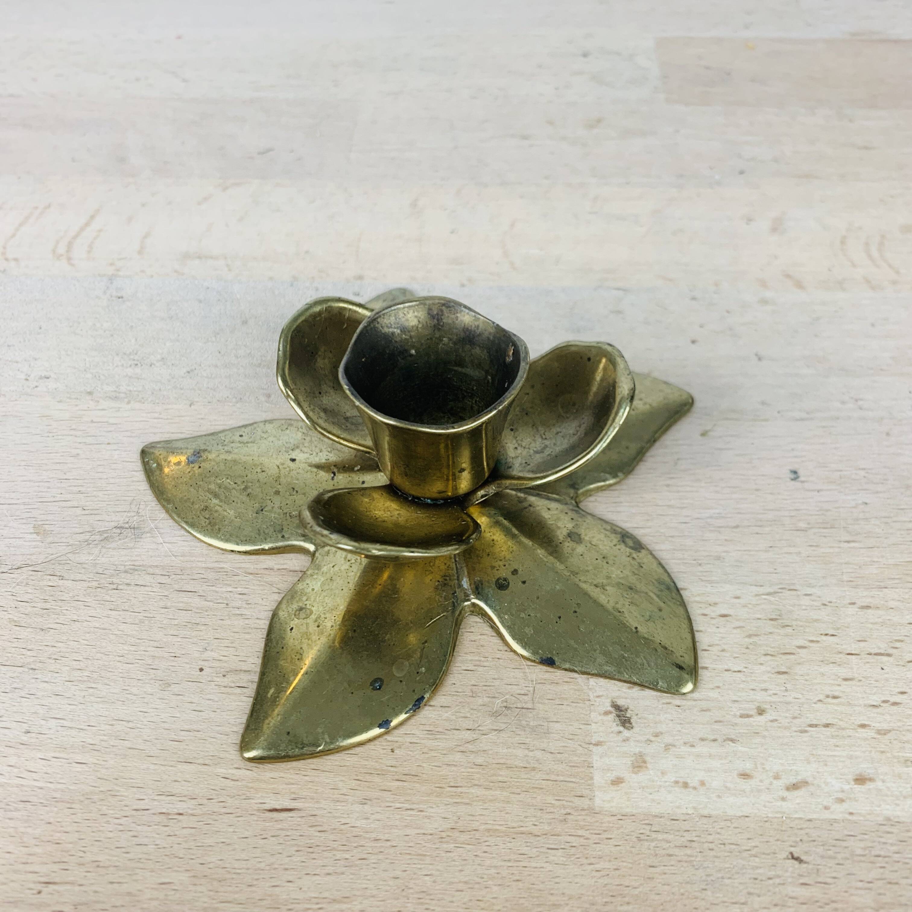 Golden brass flower candle holder