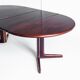Scandinavian dining table with two extensions.Gudme Mobelfabrik. Rosewood. Denmark, 1960s
