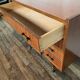 Commode vintage à 4 tiroirs poignées bakélite pieds fuseau année 1960