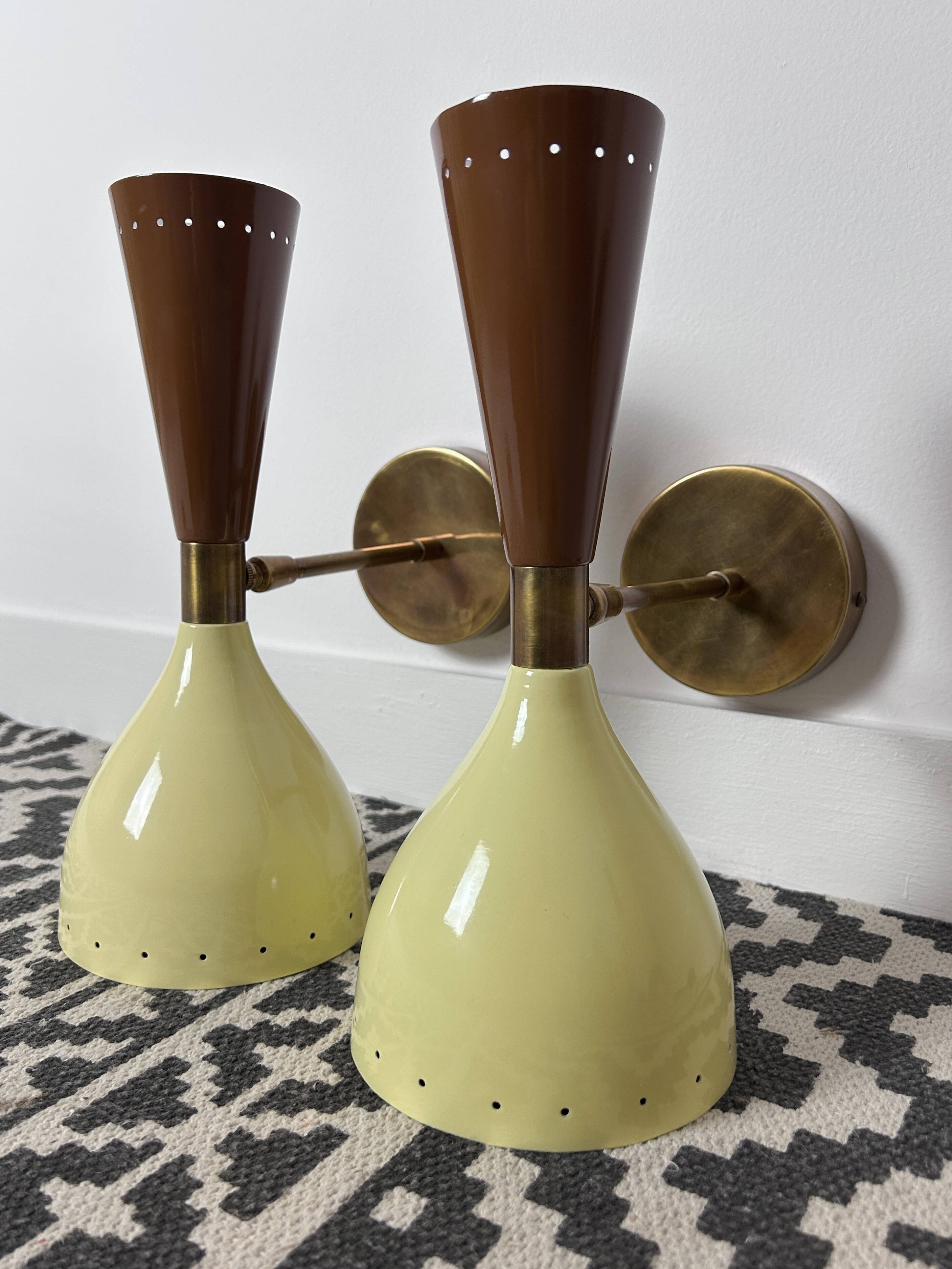 Pair of metal diabolo wall lights